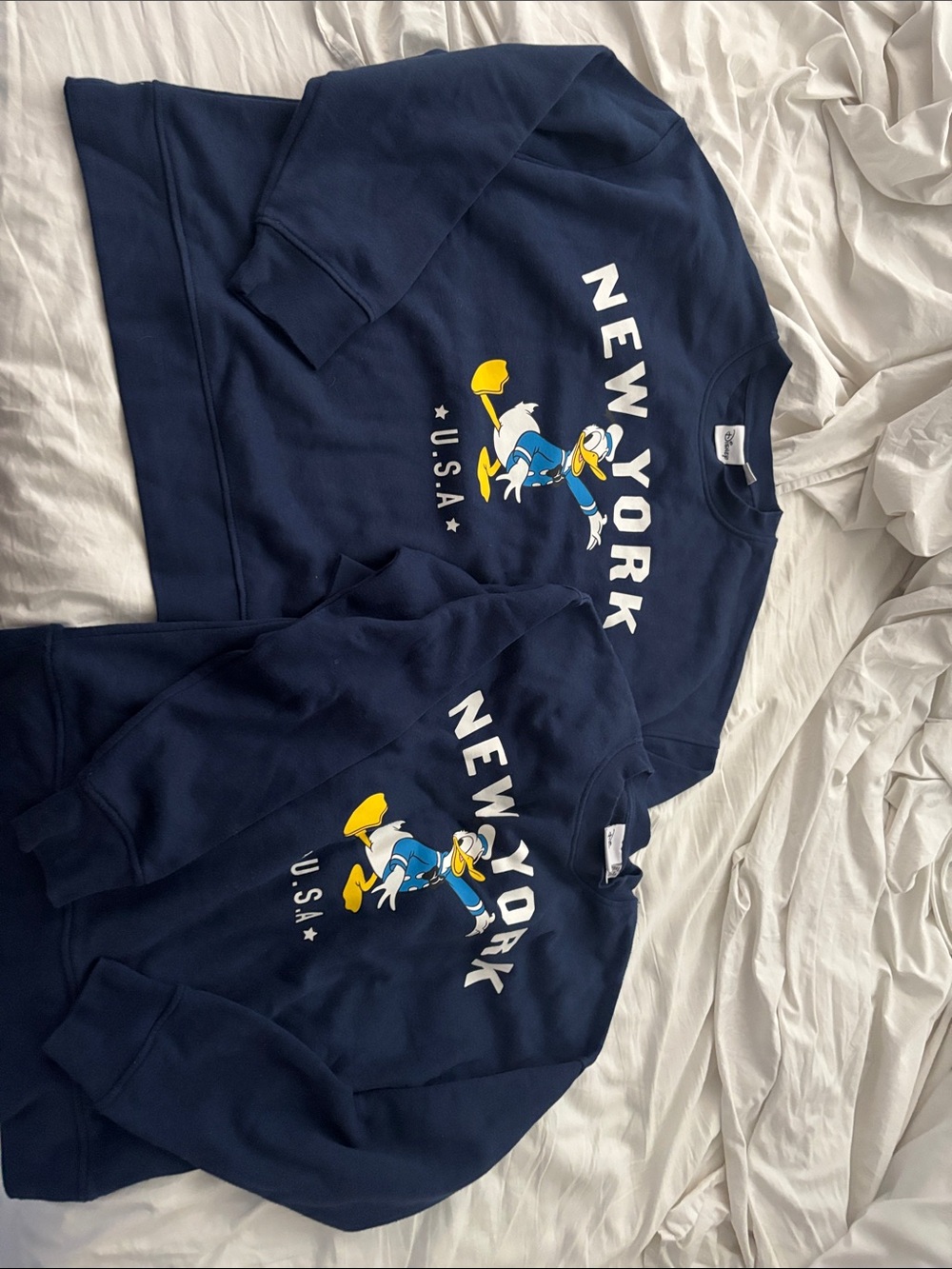 Matching Navy Graphic Donald Duck "New York" Sweatshirt one in large and one 2XS